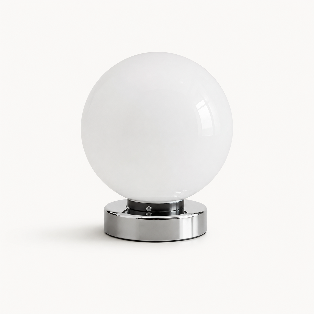 Lunora white glass balloon table lamp on a white background