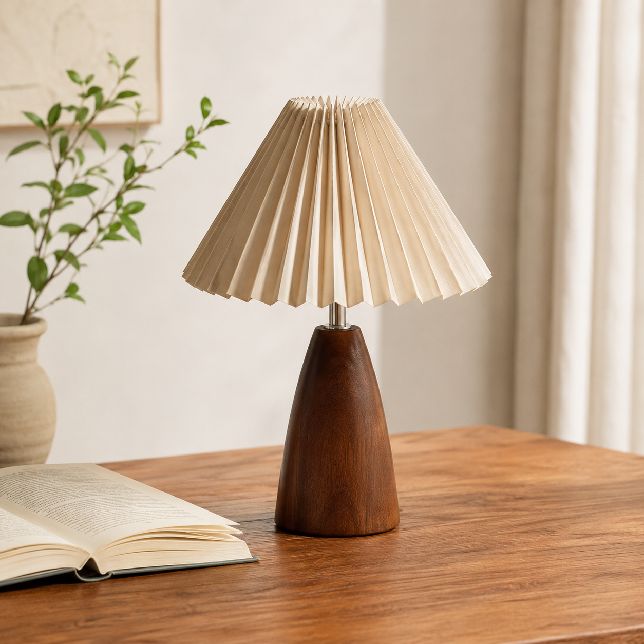 Marlow Pleated Wooden Table Lamp on a wooden desk with books and soft warm lighting