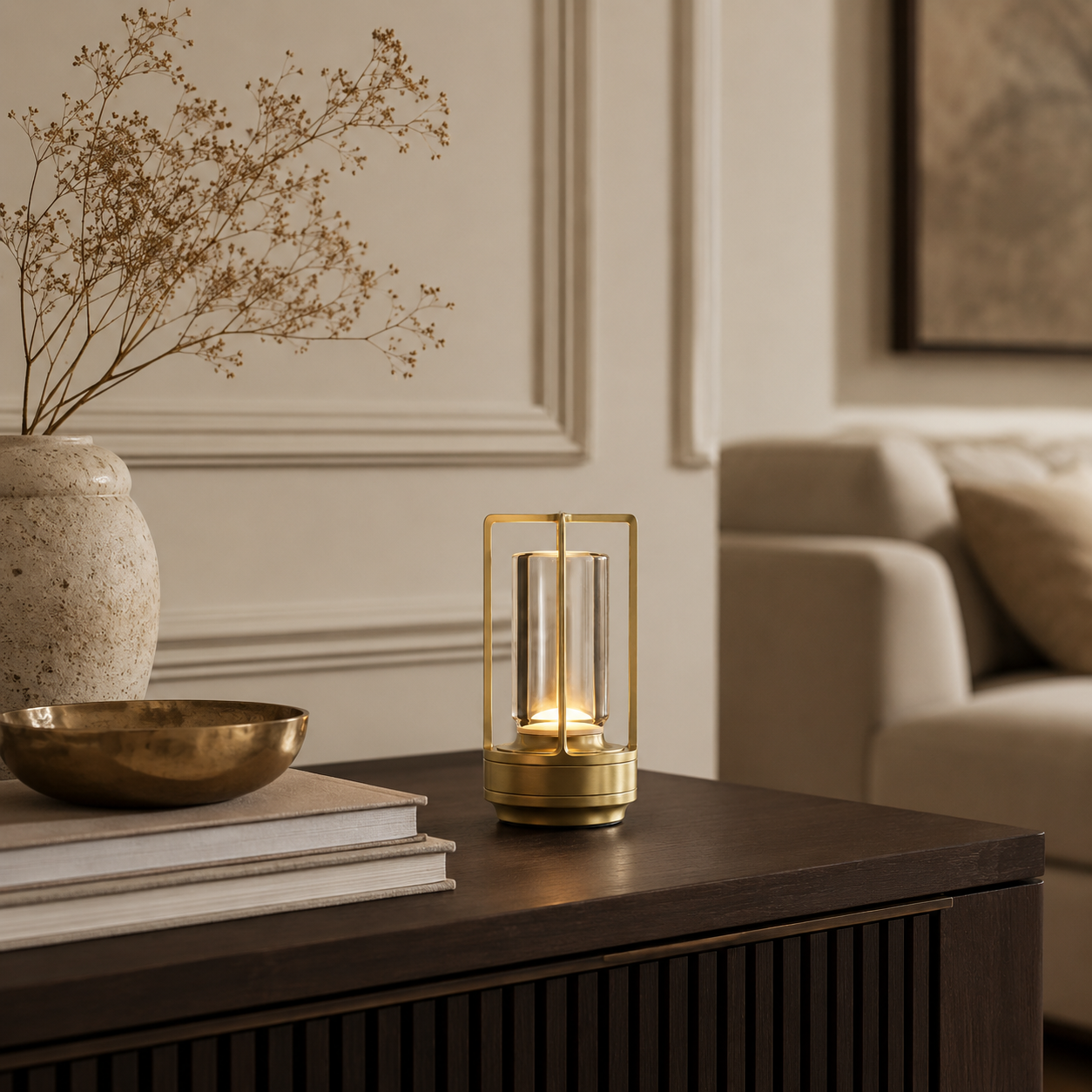 Rose gold Orien table lamp on a marble side table in a cosy living room