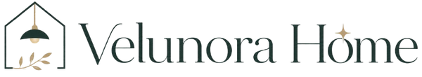 Velunora Home logo with elegant house, pendant light and botanical detail
